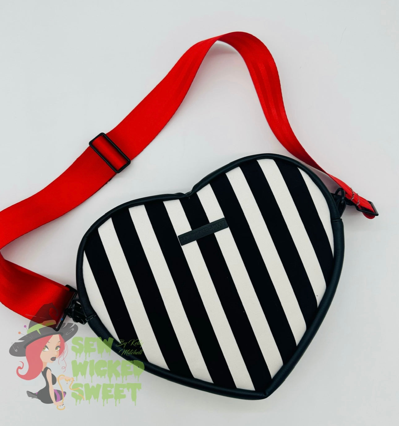 Queen of hearts heart shaped crossbody bag