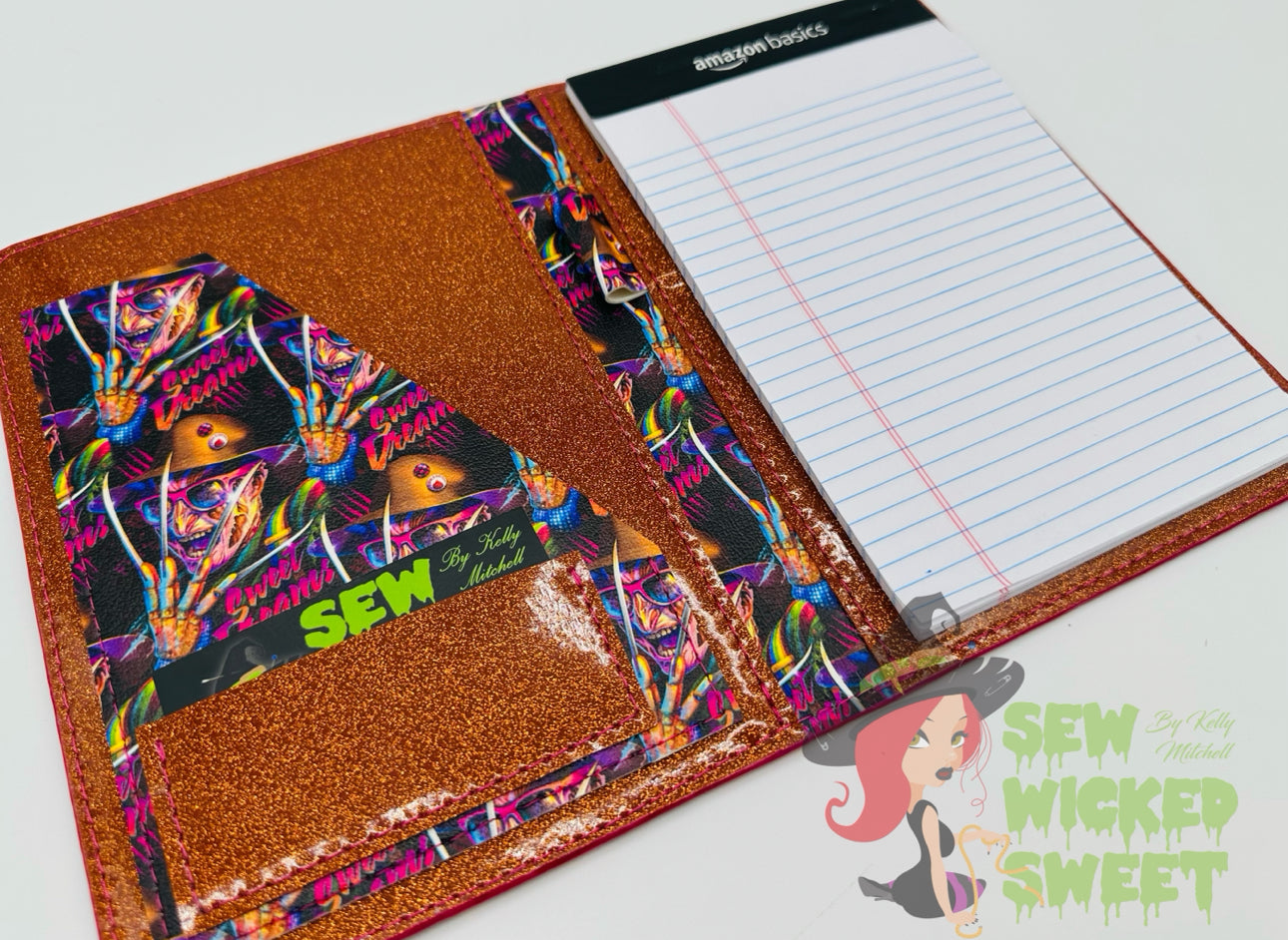 Nightmare notepad holder