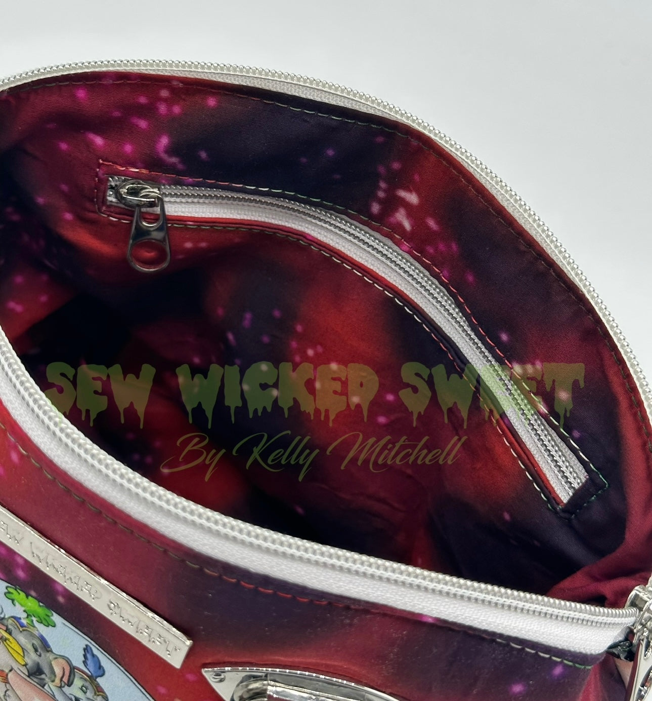 Flying elephant Christmas snow globe handbag