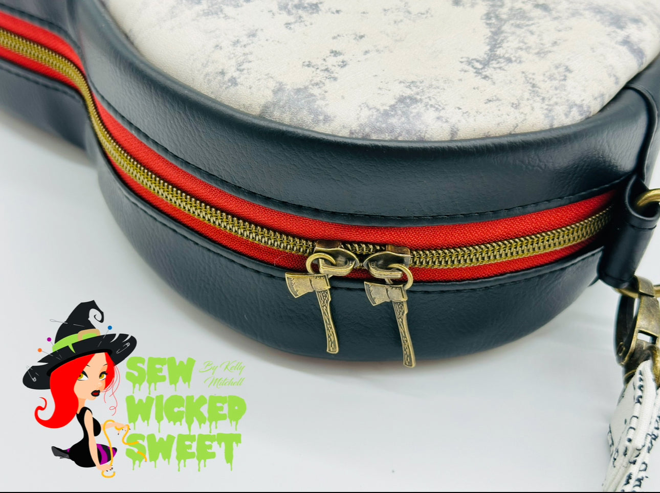 Spooky hotel heart shaped crossbody bag