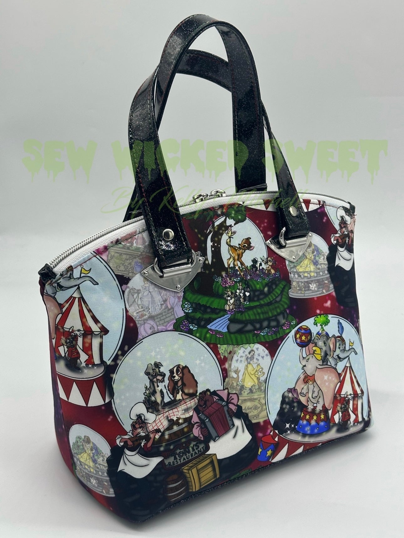 Flying elephant Christmas snow globe handbag