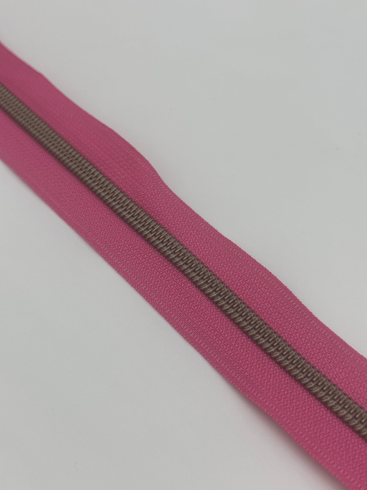 Antique bronze zipper by the yard (3 yard cut) dark pink